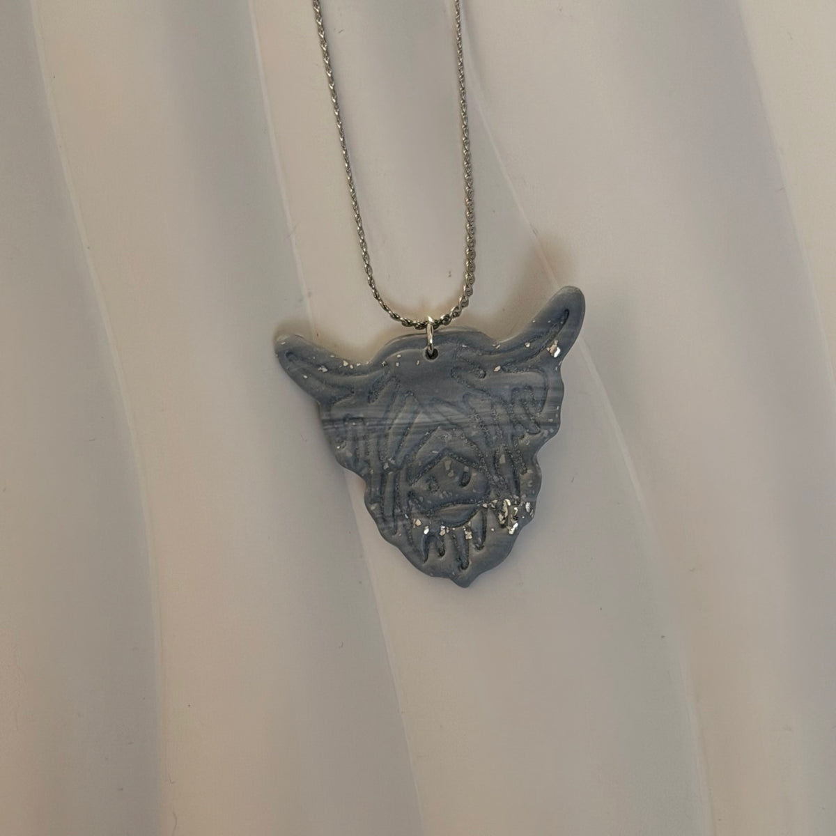 Della Stainless Steel Blue Highland Cow Handmade Necklace